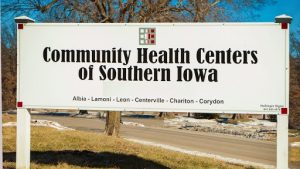 Community Health Centers of Southern Iowa Sign white with Black text 
